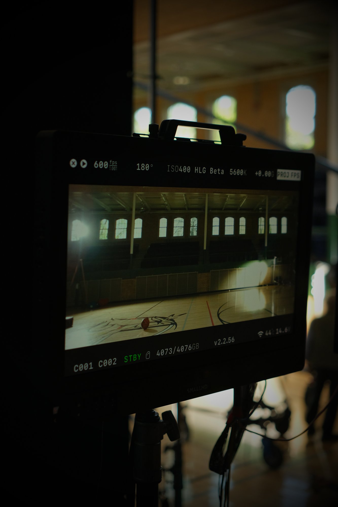 On-set monitor displaying a 600fps shot of a basketball