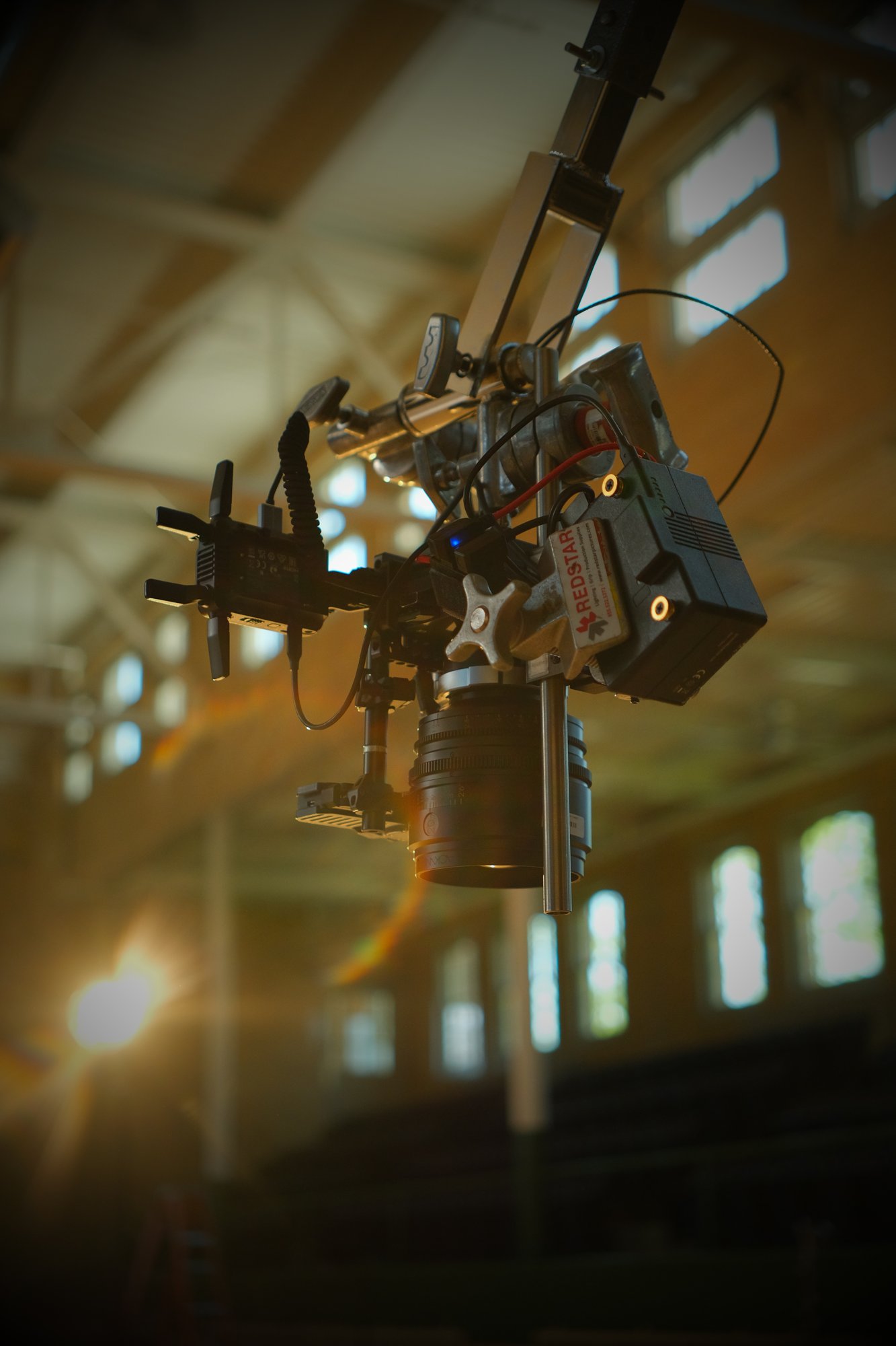 Remote camera rig mounted above the court