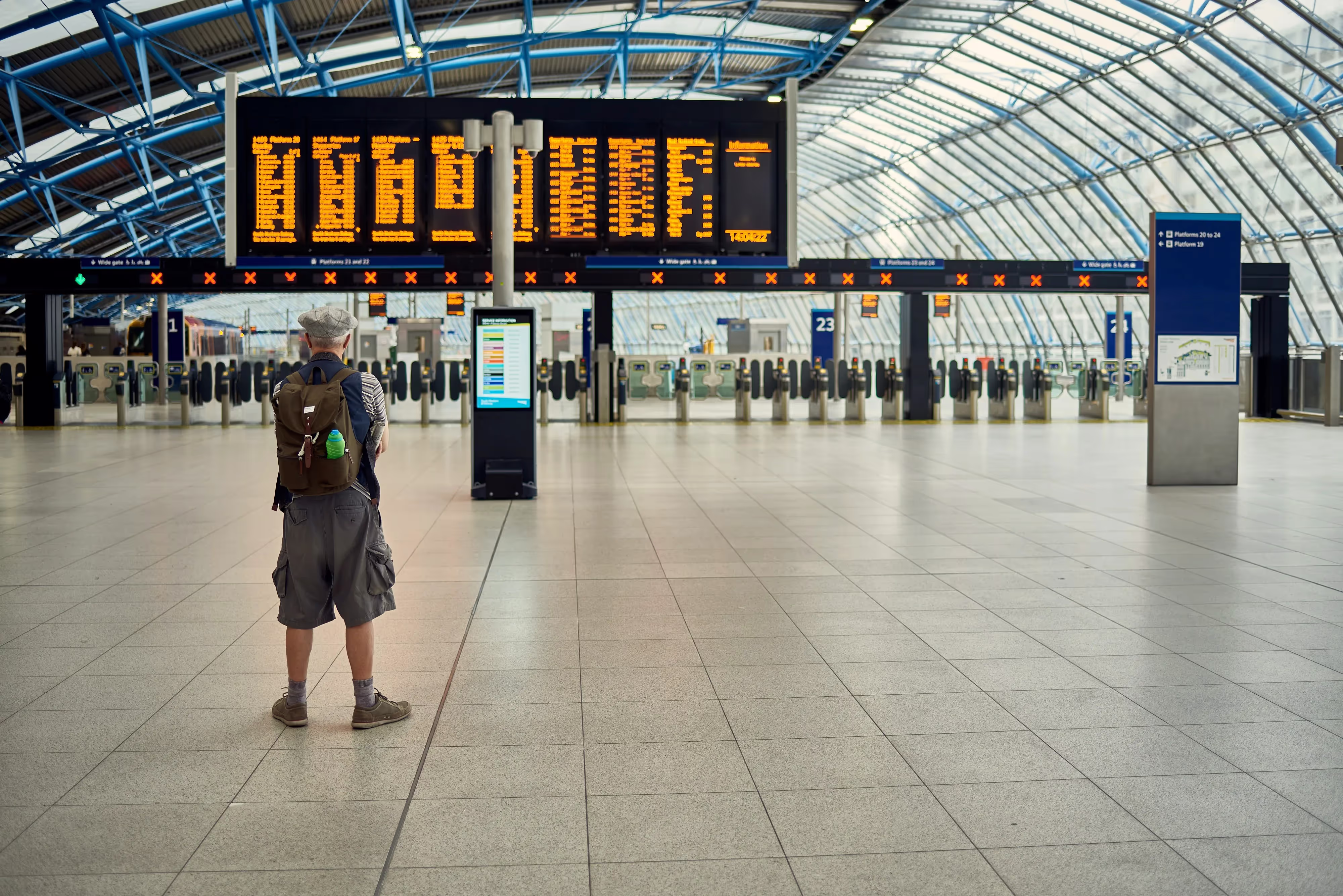 Man in empty check-in hall 