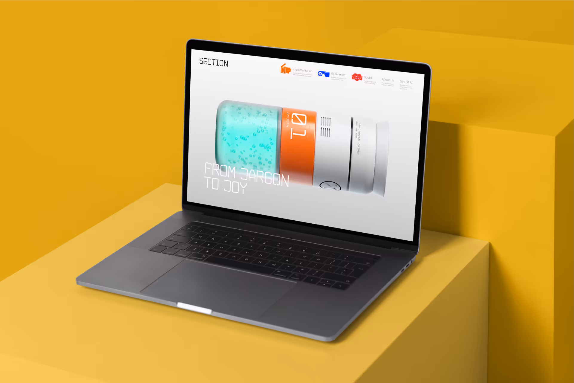 Open laptop on yellow geometric blocks displaying a webpage with a product image labeled '01 Smooth' and text 'From Jargon to Joy'.