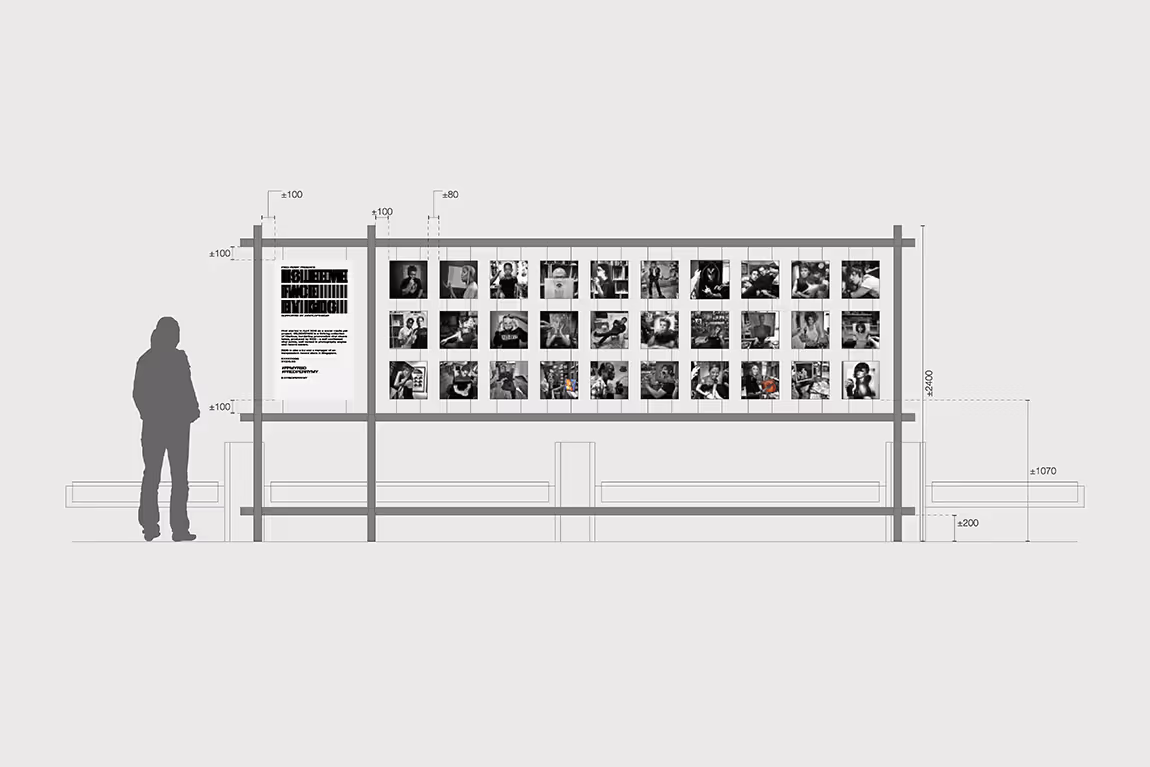 Architectural elevation drawing of a photo exhibition wall with 40 small black and white portraits arranged in two rows, a large text panel on the left, and a standing human figure for scale.