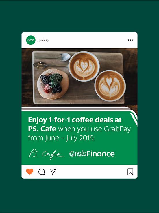 Social media post showing a wooden tray with a donut topped with berries and two cups of latte art coffee, promoting 1-for-1 coffee deals at PS. Cafe with GrabPay from June to July 2019.