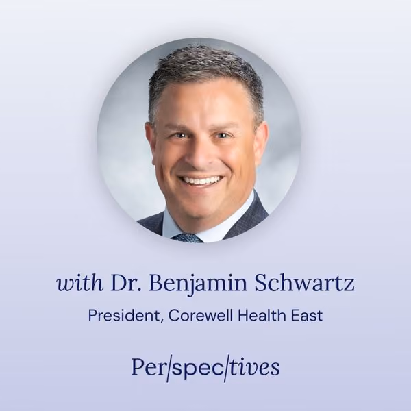Headshot of Dr. Benjamin Schwartz, President of Corewell Health East, smiling in suit and tie.
