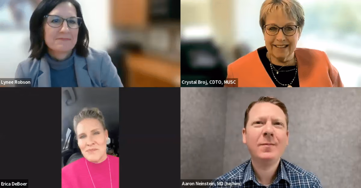 Video call with four professionals: two women and two men, each in different settings.