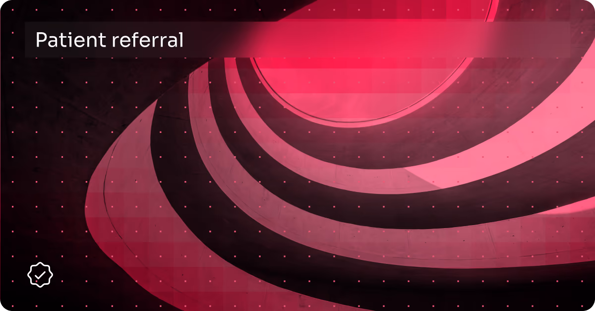 Swirling concrete spiral structure tinted pink with overlay text reading Patient referral.