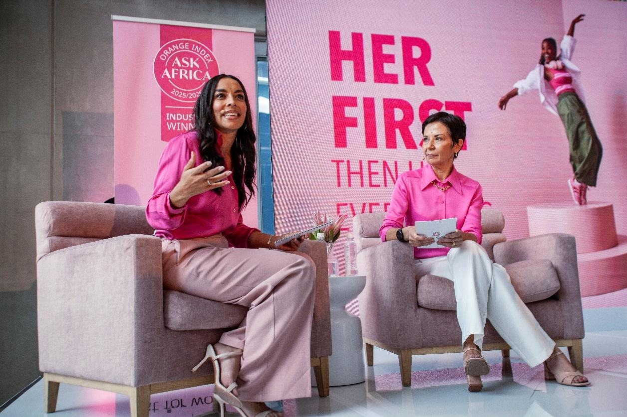 A group of women sitting in chairsAI-generated content may be incorrect.