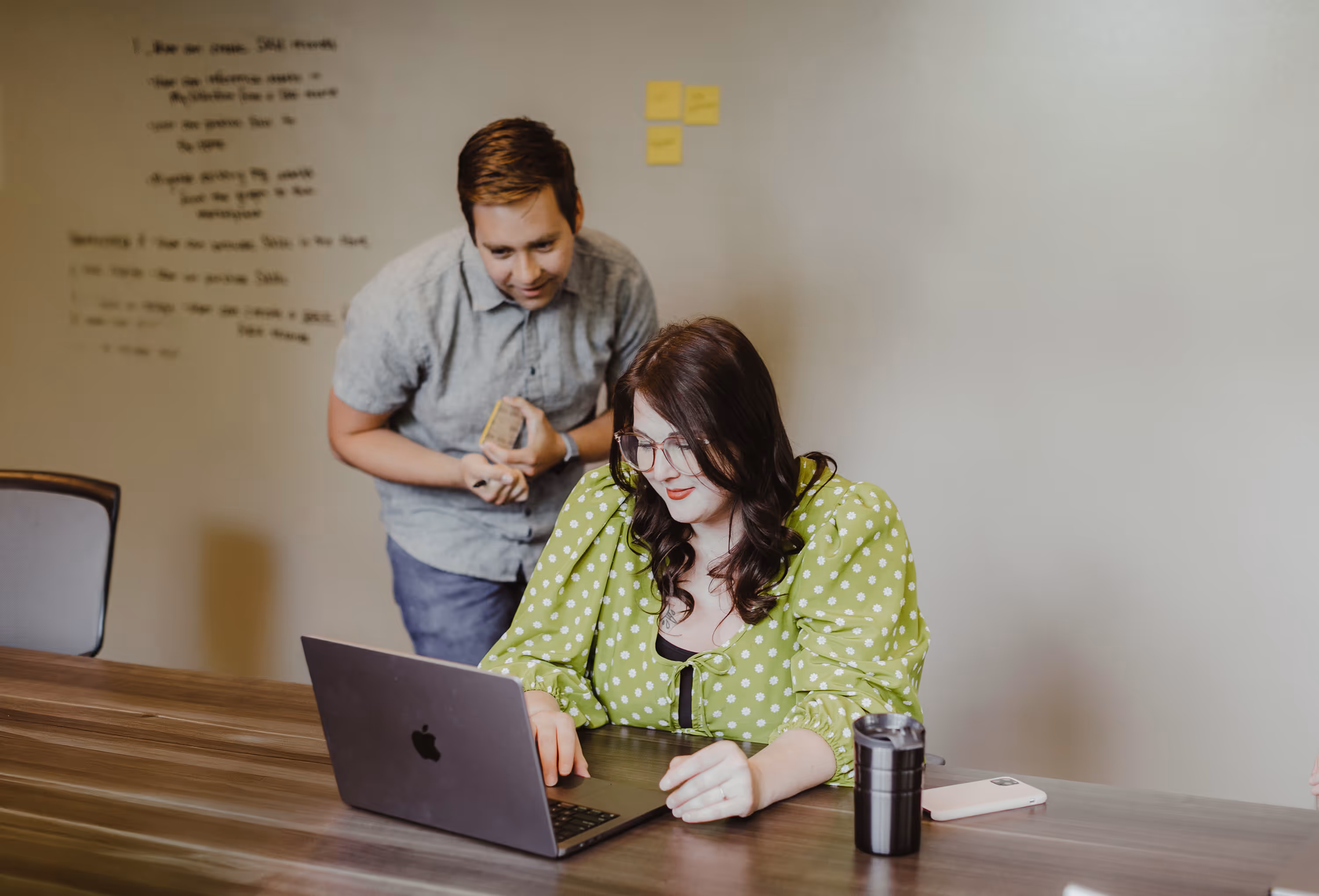 Atomic Object team members collaborating on software design during a client project