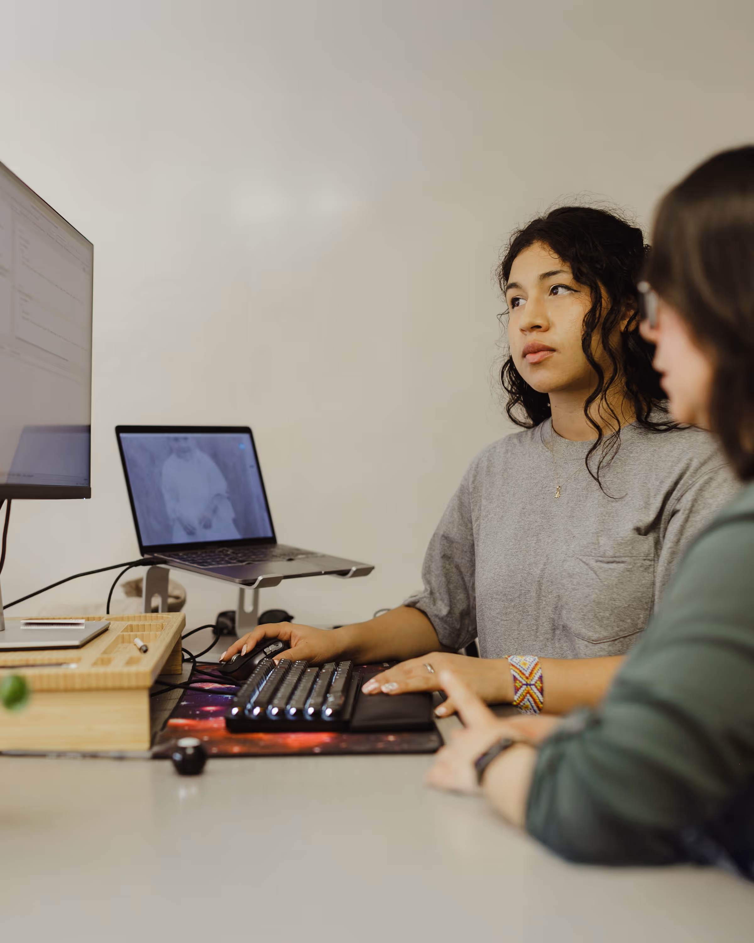 Atomic Object team members collaborating on custom software development for a client.