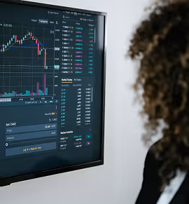 An Atomic Object custom software developer works on a trading screen UI, showing expertise in complex data visualization.