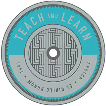 A coin featuring the Atomic Object value of "TEACH AND LEARN"