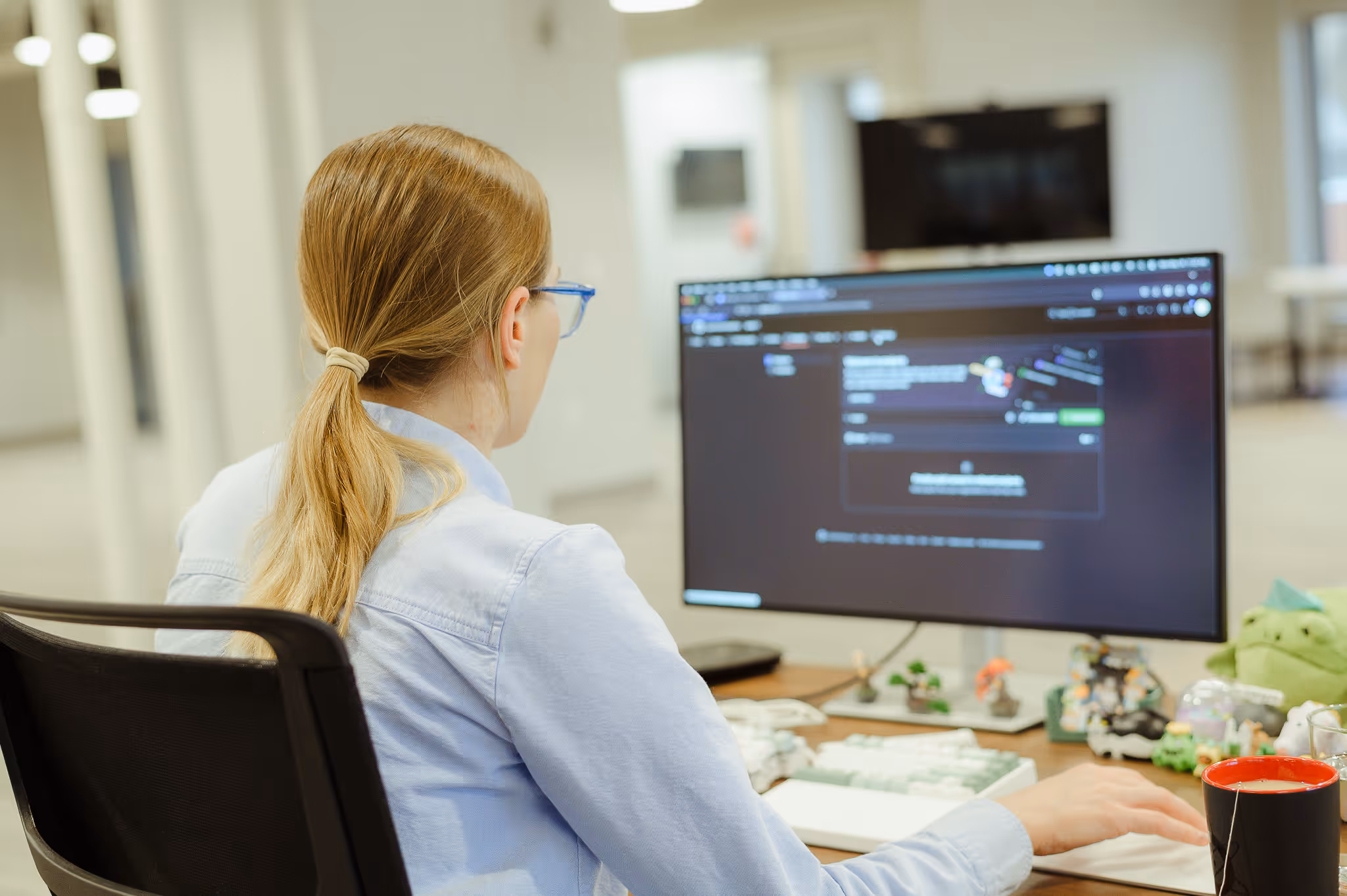 An Atomic developer coding and utilizing AI for software development tasks.