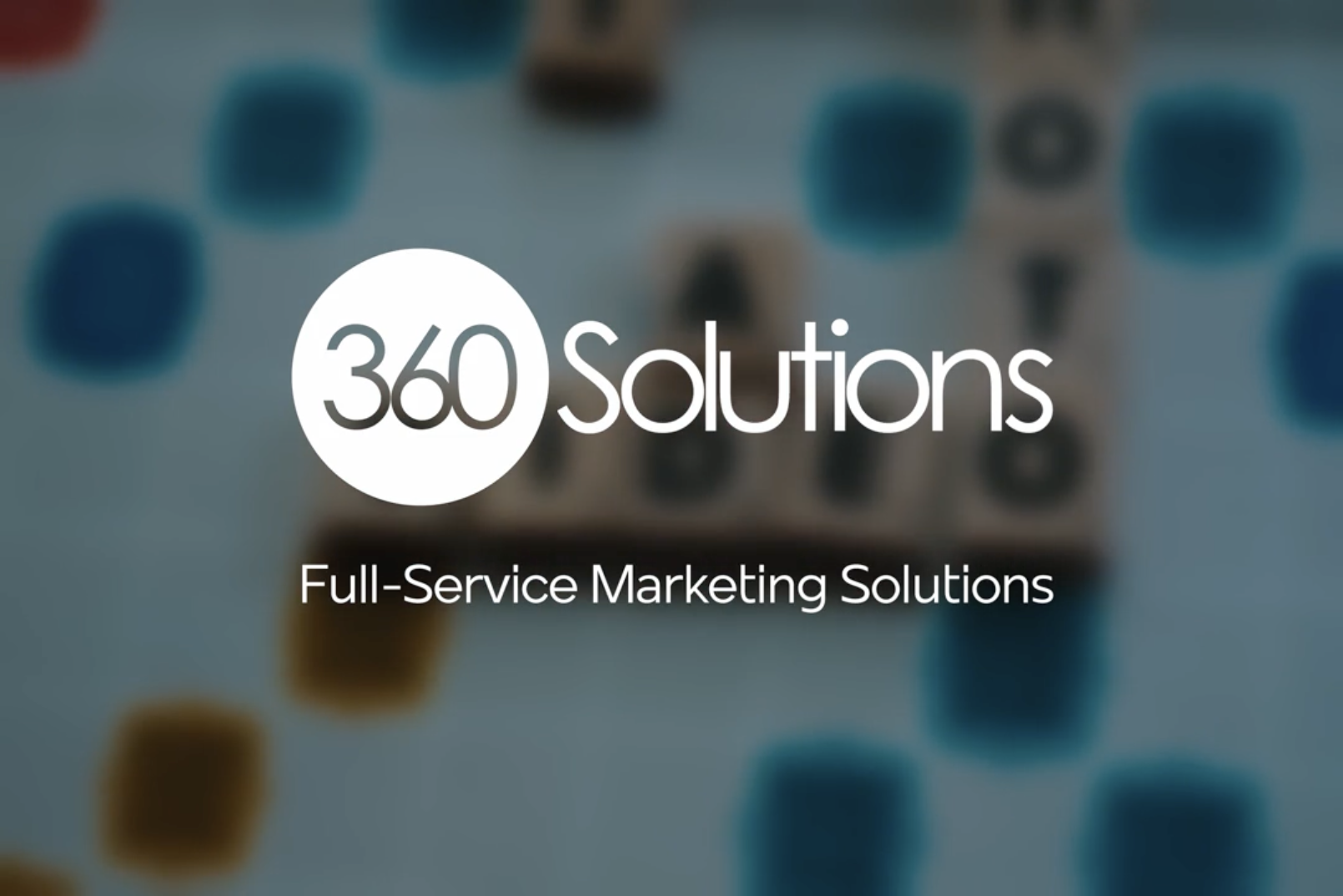 Headline '360 Solutions Full-Service Marketing Solutions' with game of Scrabble in the background.