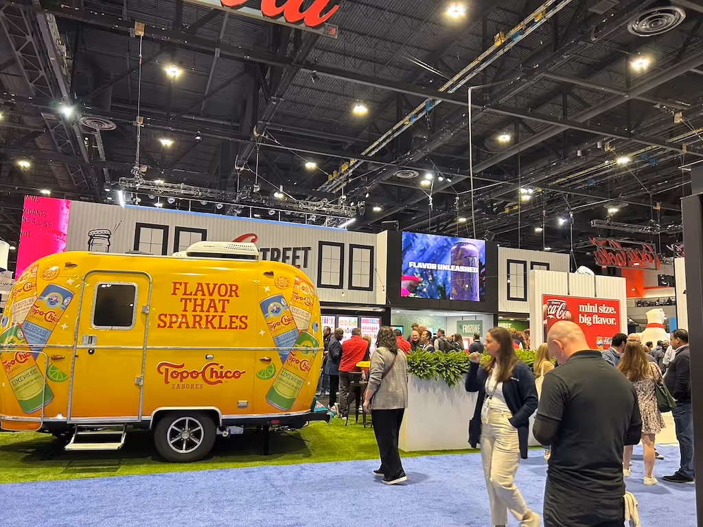 A first-time visitor's perspective at NACS Chicago, highlighting insights into the convenience store and foodservice industry, showcasing innovative store designs, engaging brand experiences, and emerging trends in product innovation.