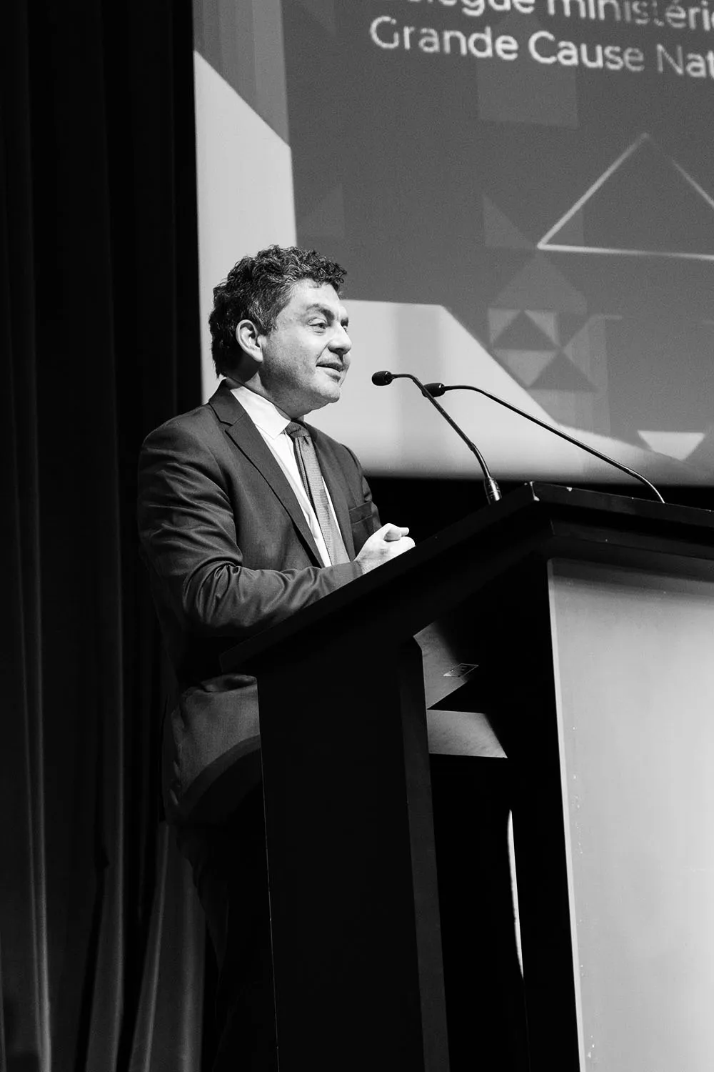 Reportage photos, conférence GSW, portrait d'une personne devant un pupitre