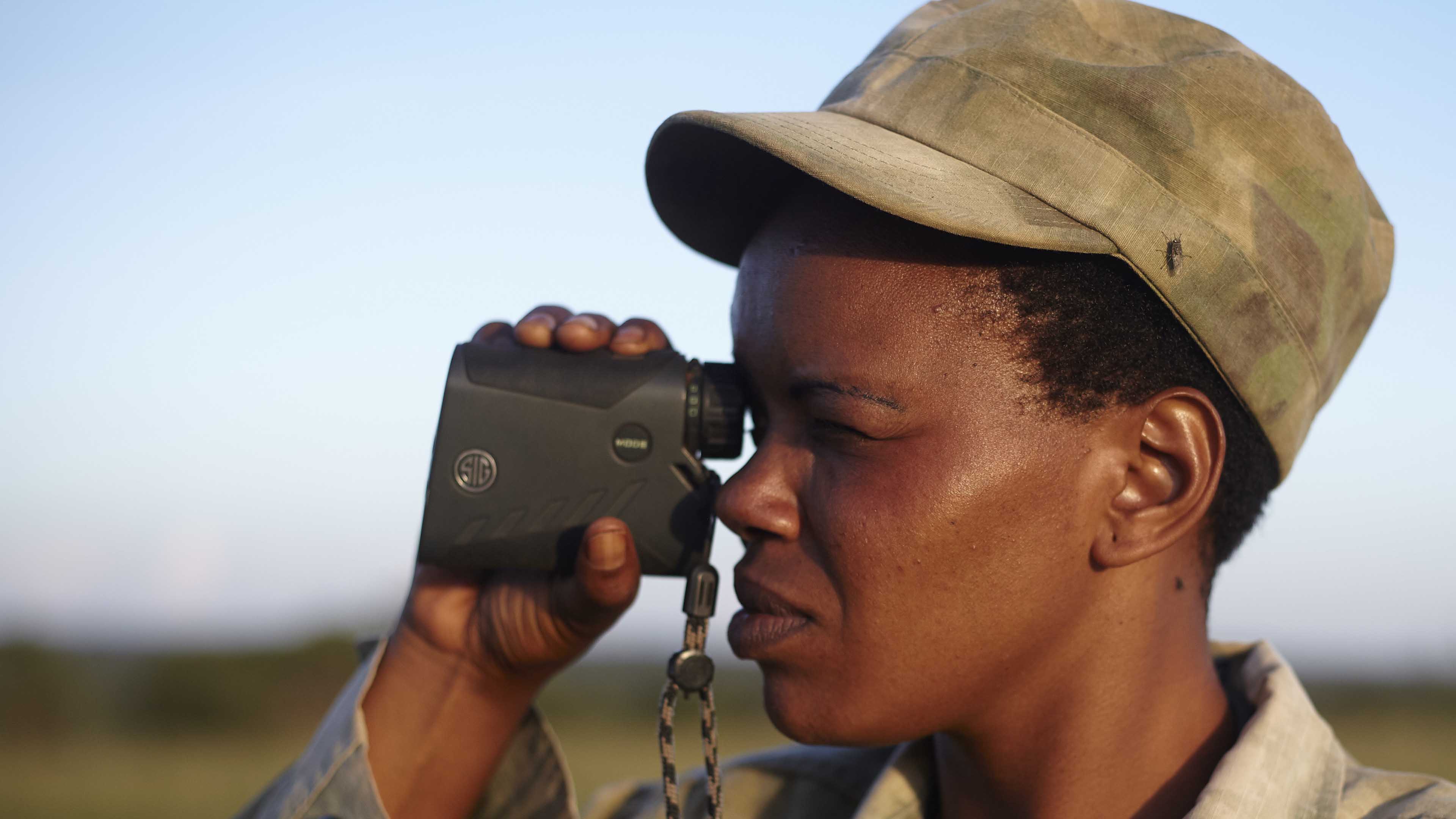 Woman working as a community scout in Tanzania