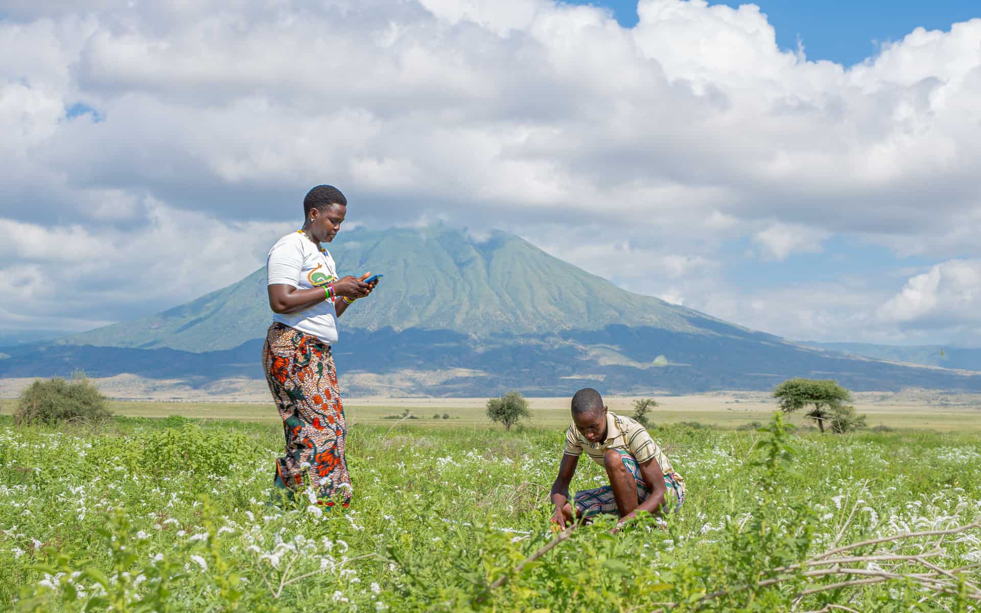 Grassland monitors collect habitat data with conservation technology. Credit: Emmily Tunuka/APW