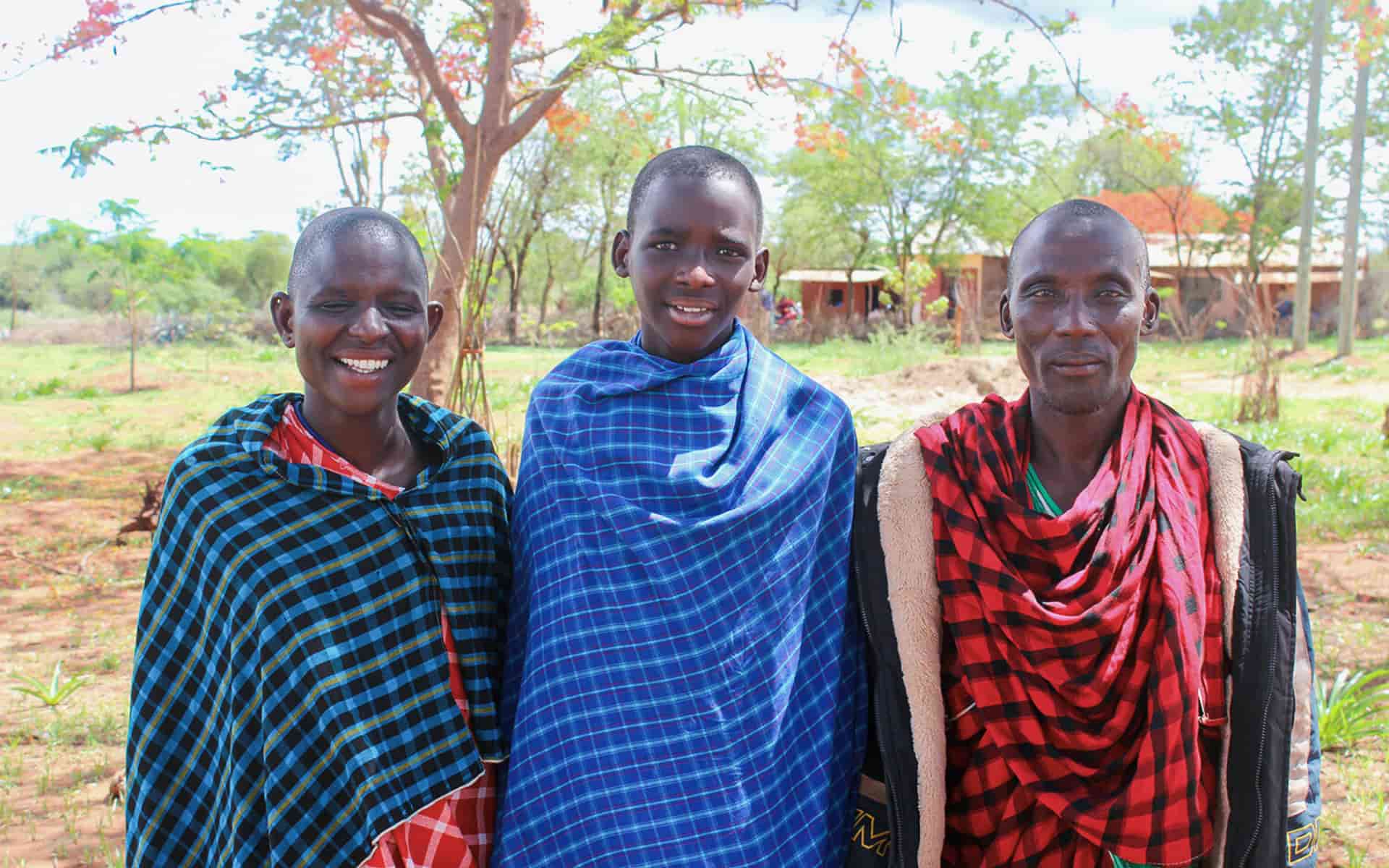 Noah and his parents visit his primary school in Loibor Siret.