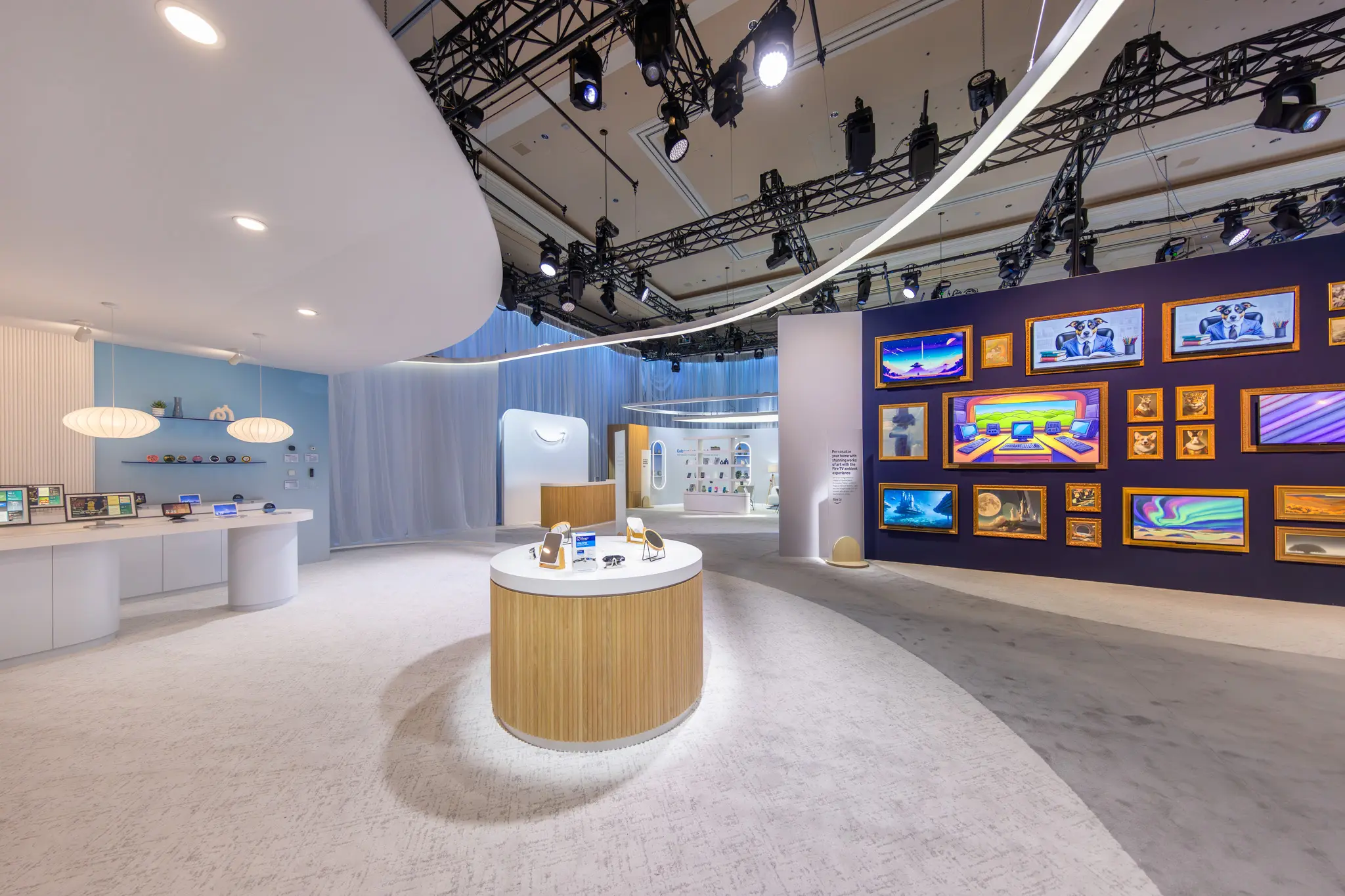 Modern exhibition room with sleek futuristic design, featuring tech displays on tables. Vibrant digital art frames adorn a purple wall, creating a dynamic, innovative atmosphere.