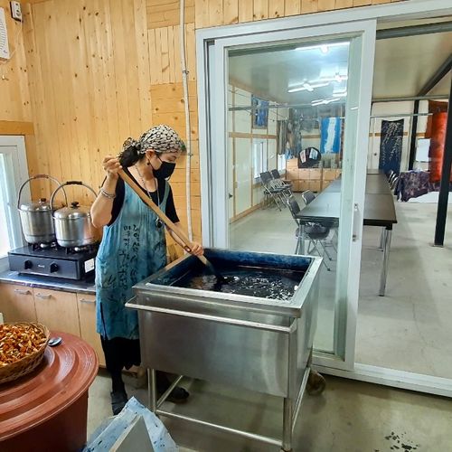 Cloths being dyed using traditional Korean natural dye technique.