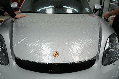 2021 Porsche Cayman 718 silver. Paint protection film and ceramic coating in Mandeville, Louisiana installed by Fortify Detail Labs.