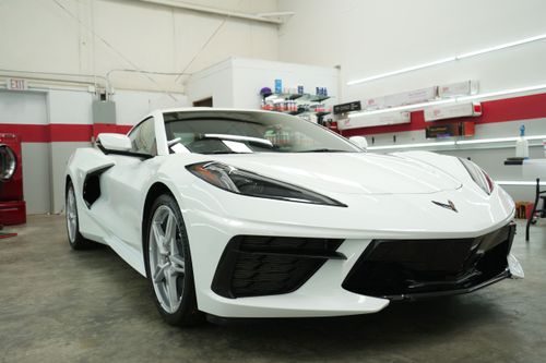 2021 Chevrolet Corvette C8 white in a automotive protection studio at Fortify Detail Labs. Service areas Covington, Mandeville, New Orleans, Hammond, Louisiana.