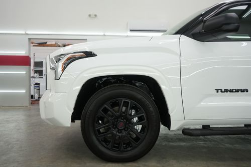 2022 Toyota Tundra SR5 white in for paint protection film and ceramic coating at Fortify Detail Labs. Fortify Detail Labs serves the north shore Louisiana area including Mandeville, Covington, Hammond, Slidell areas as well as the Greater New Orleans area.
