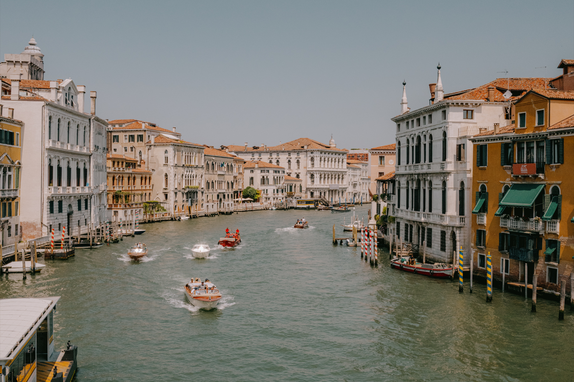 Luxury Venice Grand Canal with historic palazzos and water taxis, representing boutique hospitality excellence by brand strategist Jasmine Tam