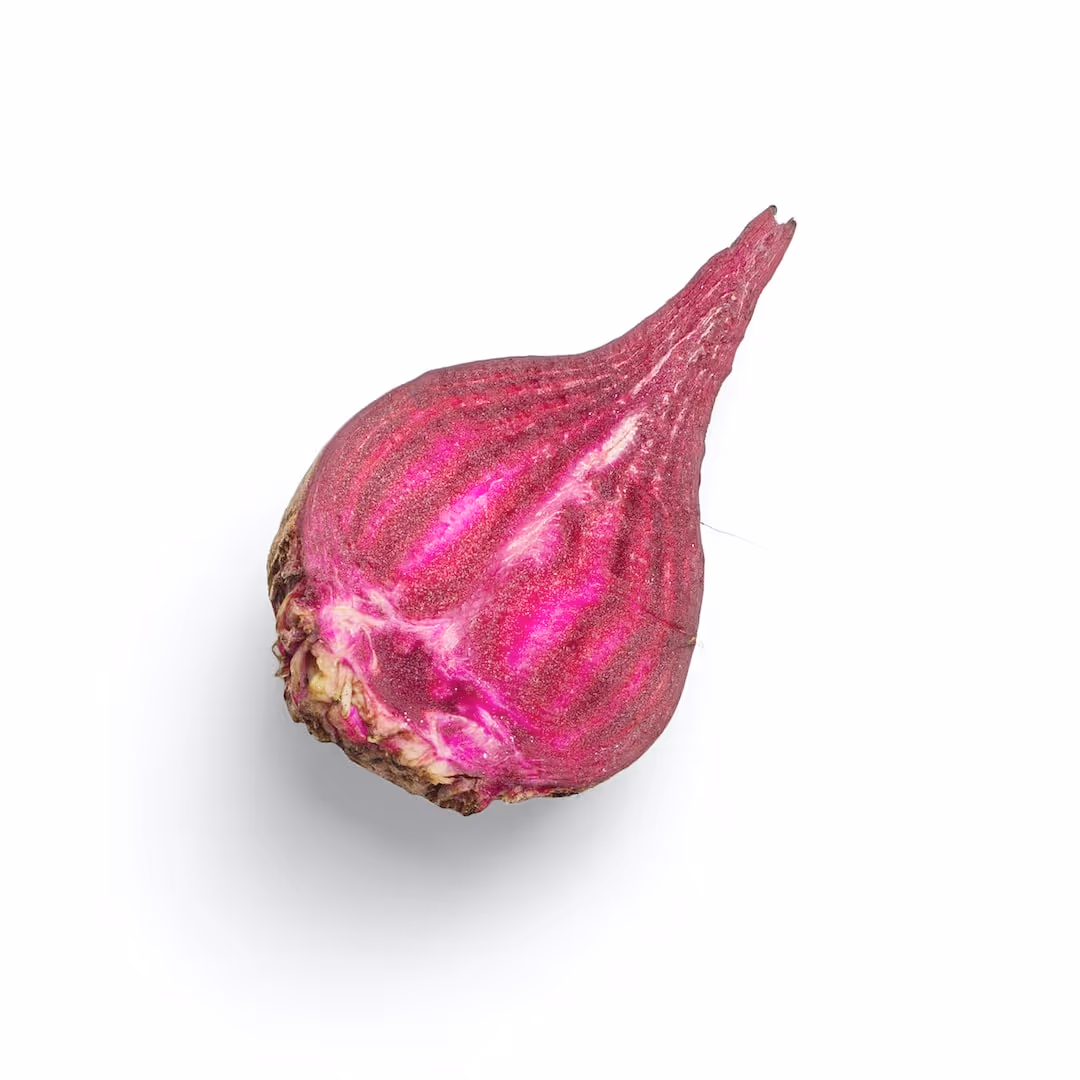 Beetroot plants growing in garden soil.