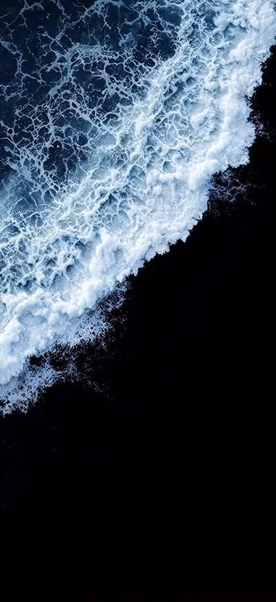 Aerial view of black beach and sea wallpaper