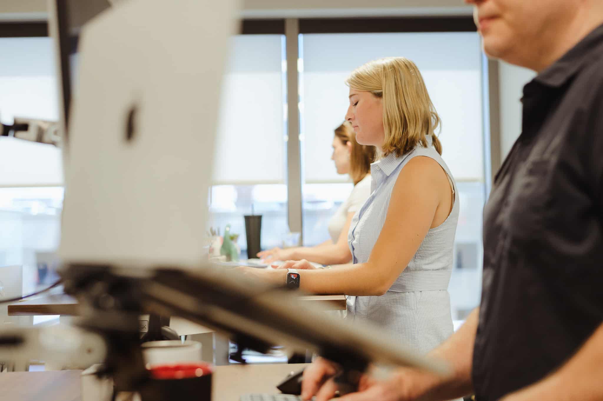 Pictured are developers at Atomic Object's Raleigh office. Post title: 3 Useful Svelte/Sveltekit Features