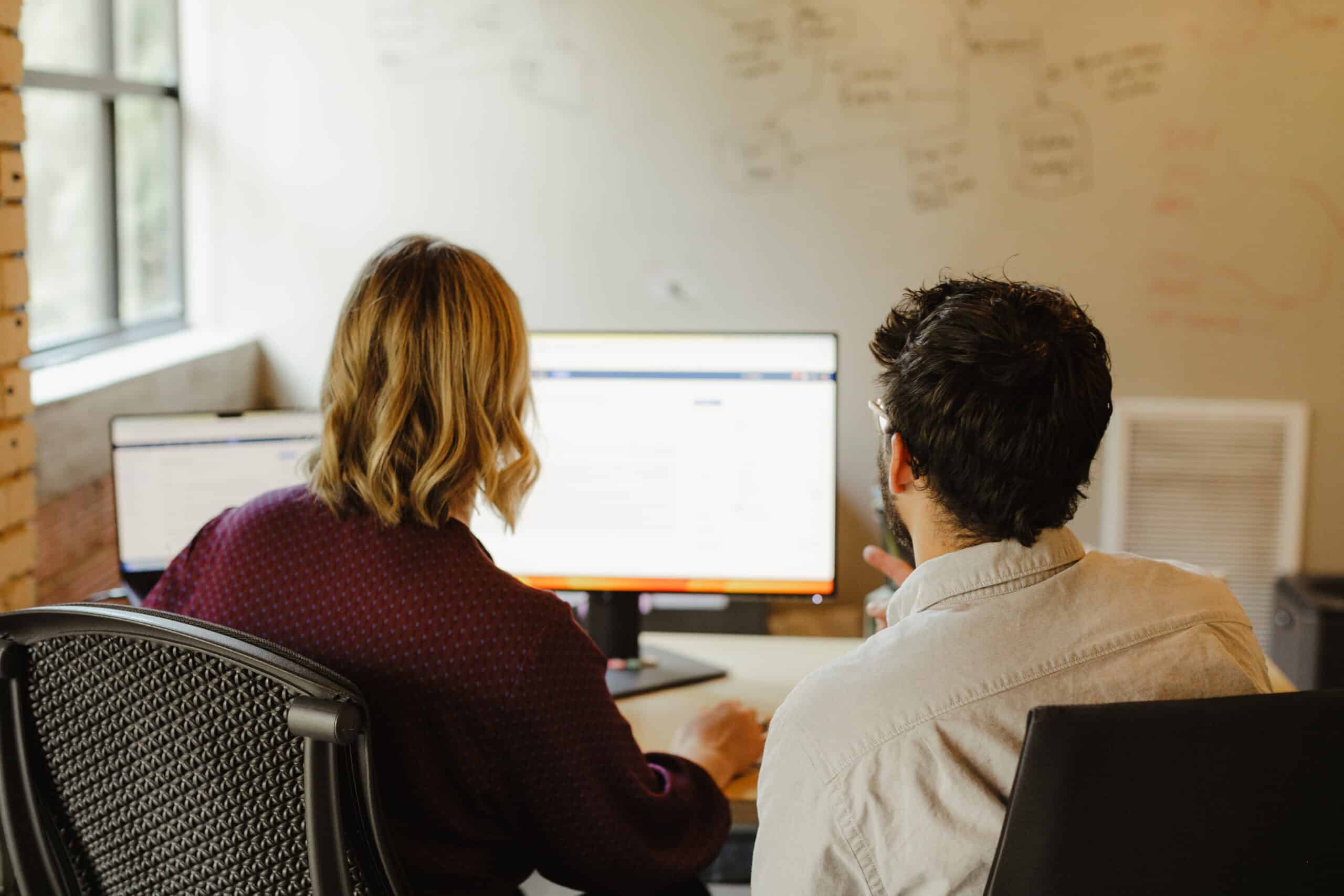 Two developers pair programming. Post title: Thanks to AI, Mentorship Pair Programming Isn't What It Used To Be