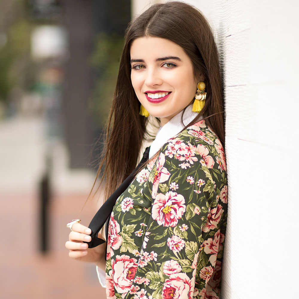 Portland senior in floral shirt smiling at the camera