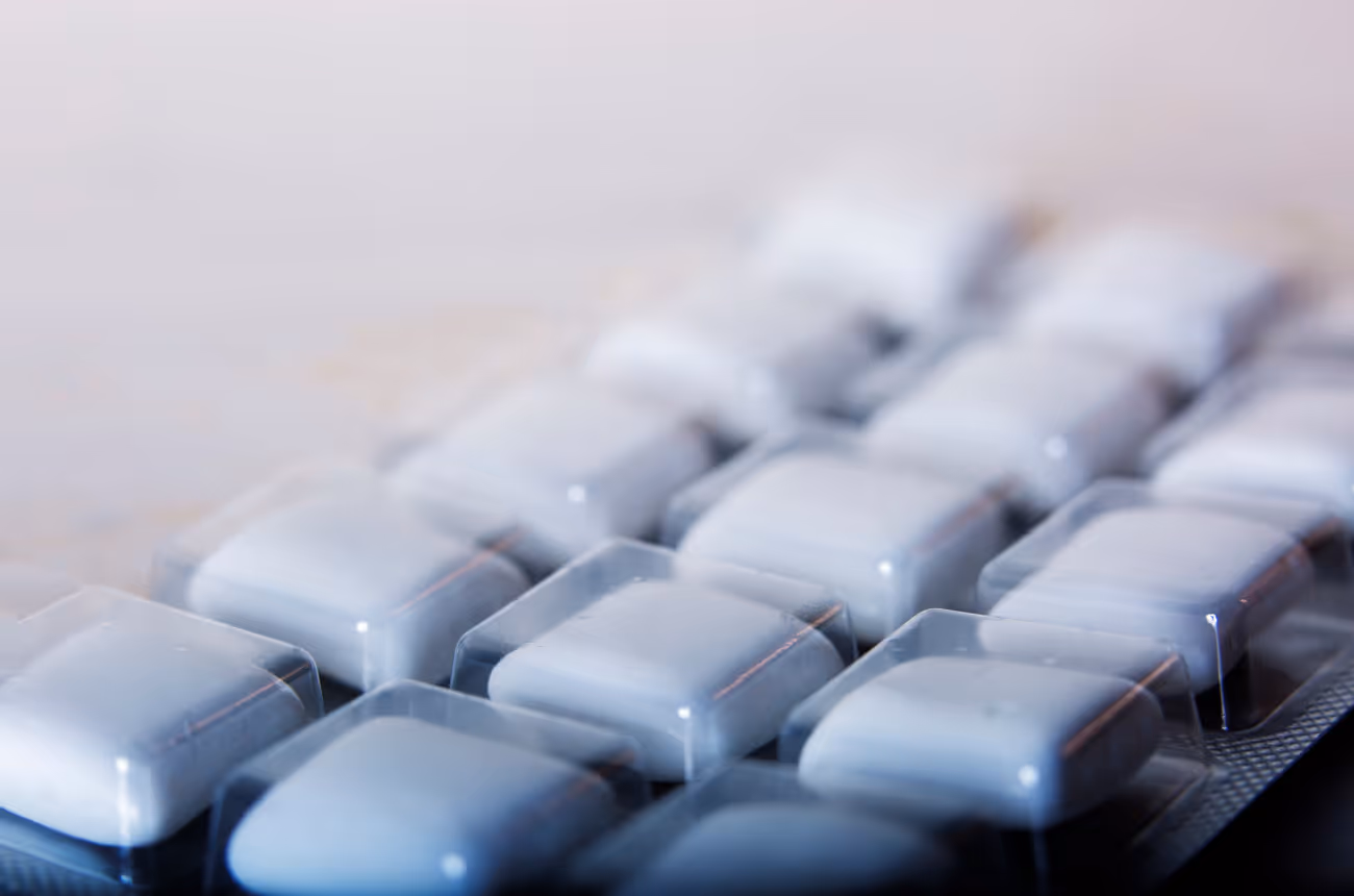 close up photo of package of nicotine replacement therapy gum