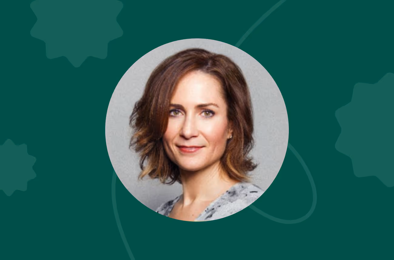 Headshot of Dr. Heather Patrick, VP of Behavioral Science on green background