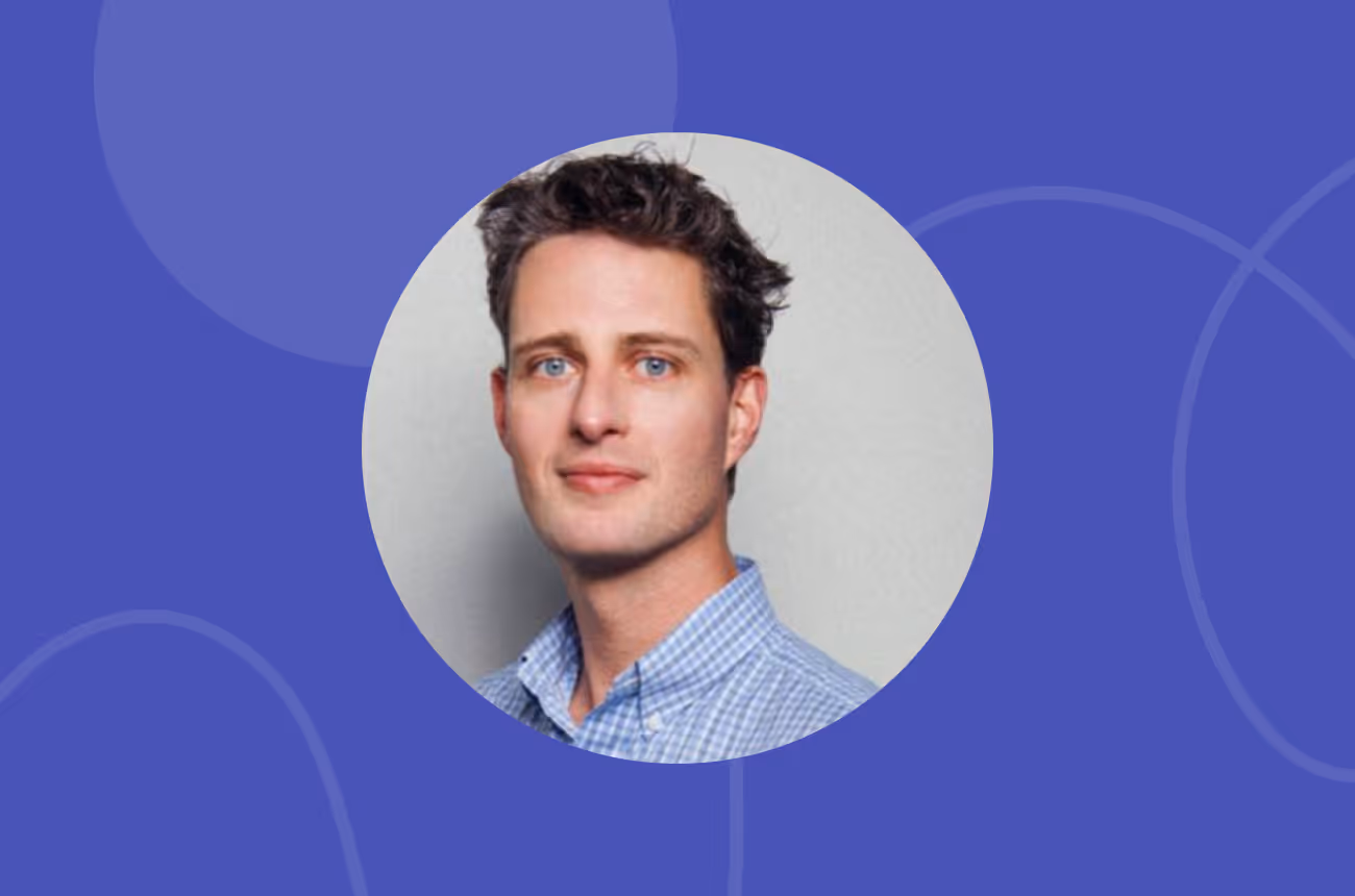 Headshot image of Dennis Rohm, CTO on blue background