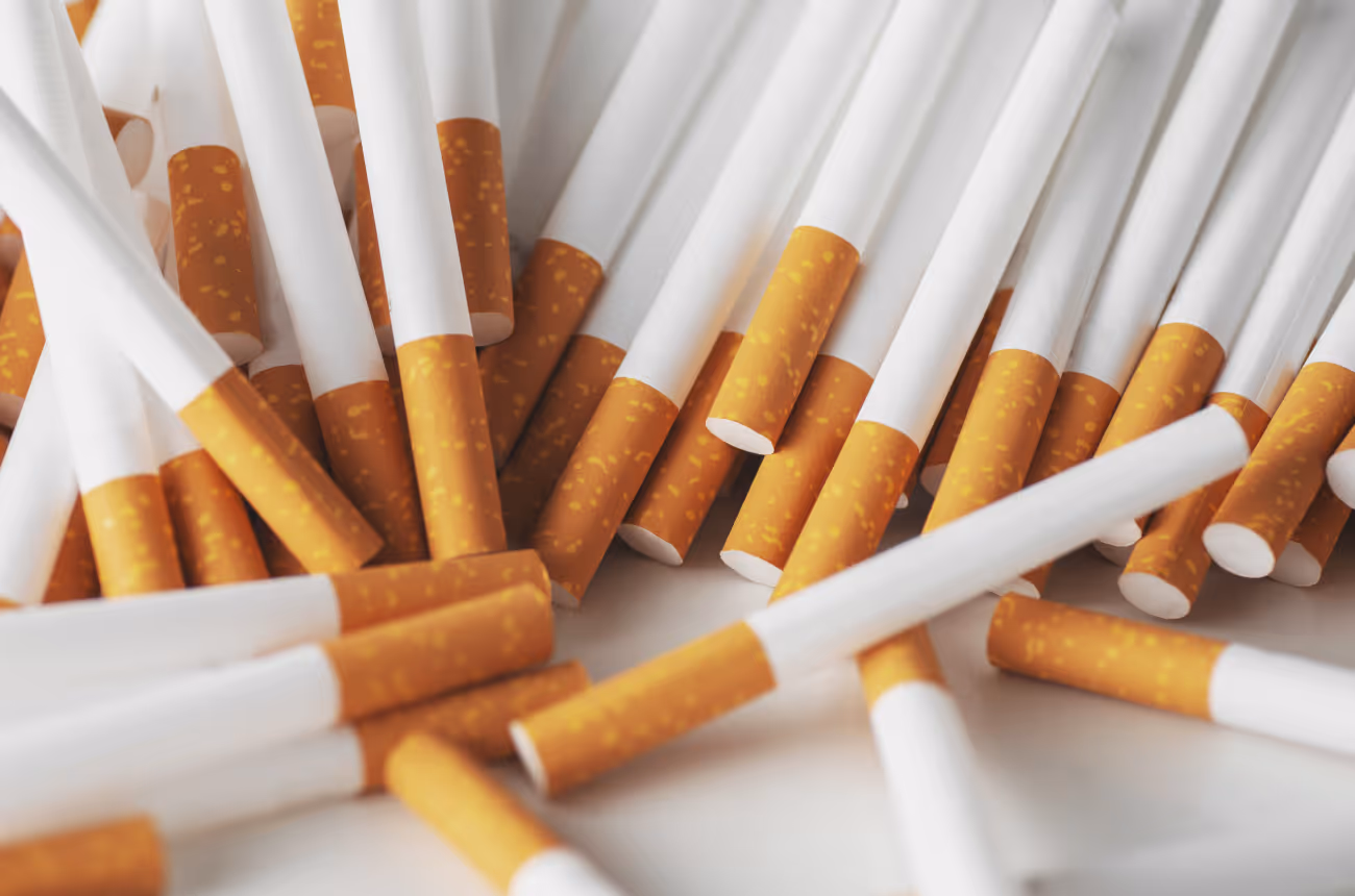 Tens of loose cigarettes outside of pack