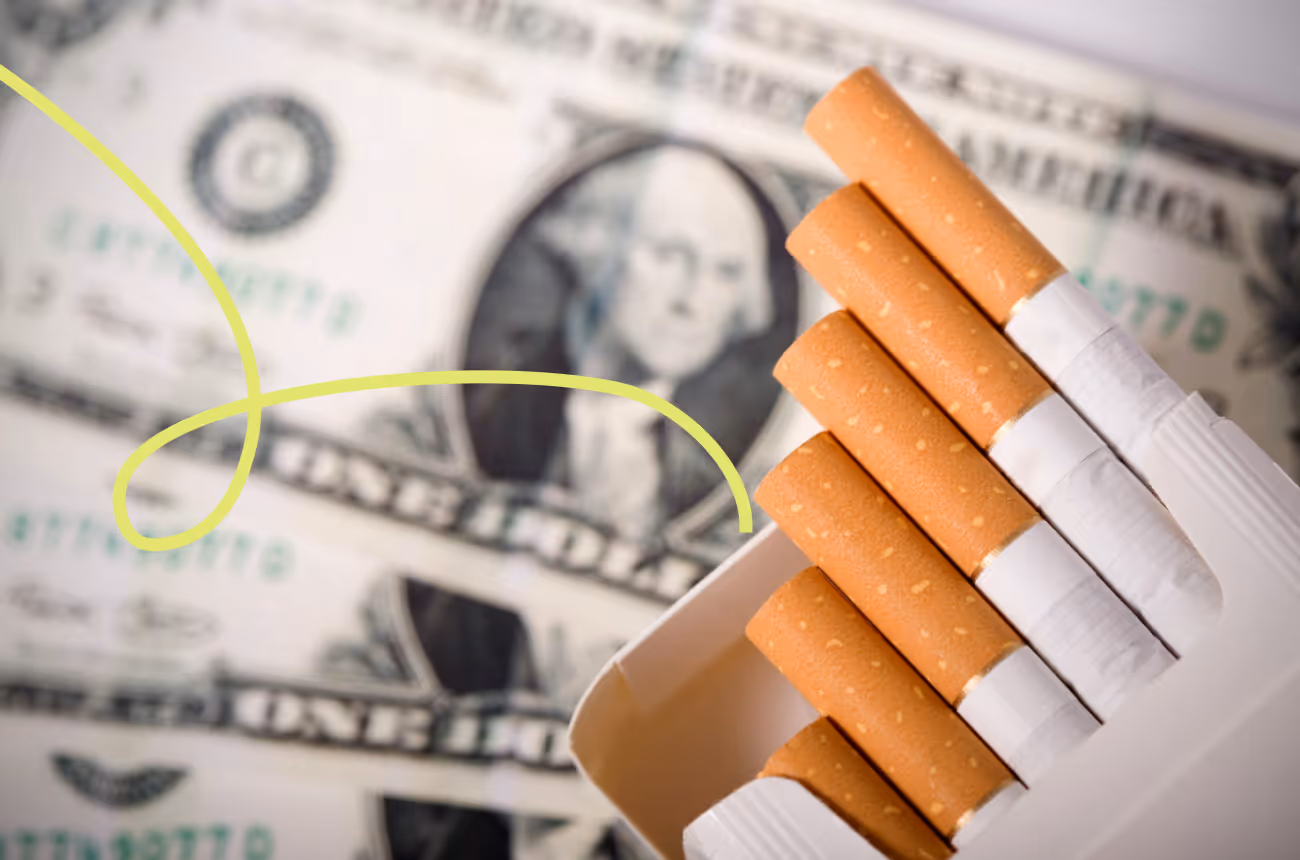 image of cigarettes on a background of money