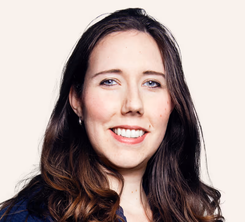 photo of woman wearing a blue shirt