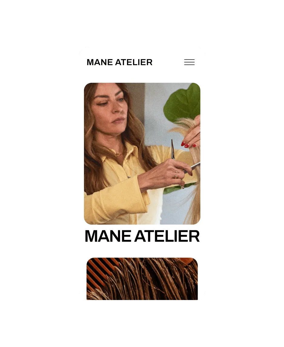 A mobile view of the 'MANE ATELIER' salon booking website, featuring a hairstylist cutting a client’s hair.