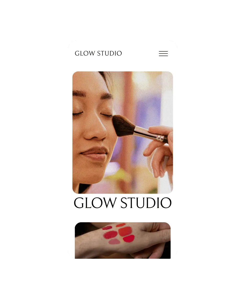 Mobile view of Glow Studio website featuring woman getting makeup brushed onto face