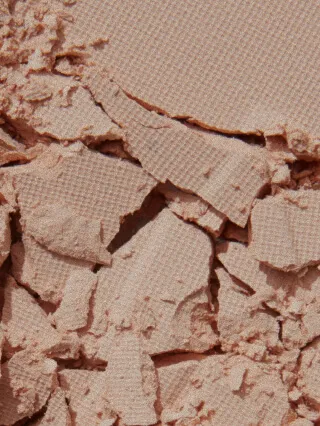 Closeup of cracked and crumbled makeup