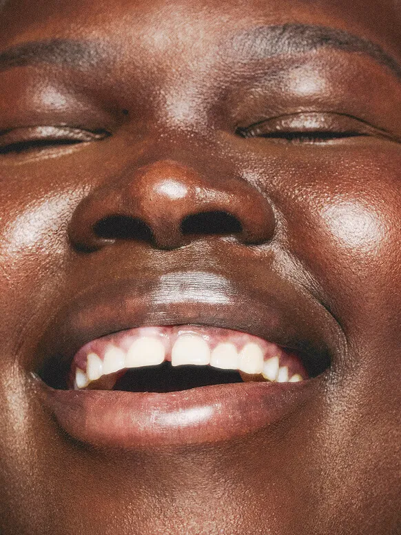 Closeup of a woman’s smiling face