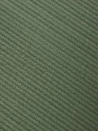 Closeup of a dark green pattern