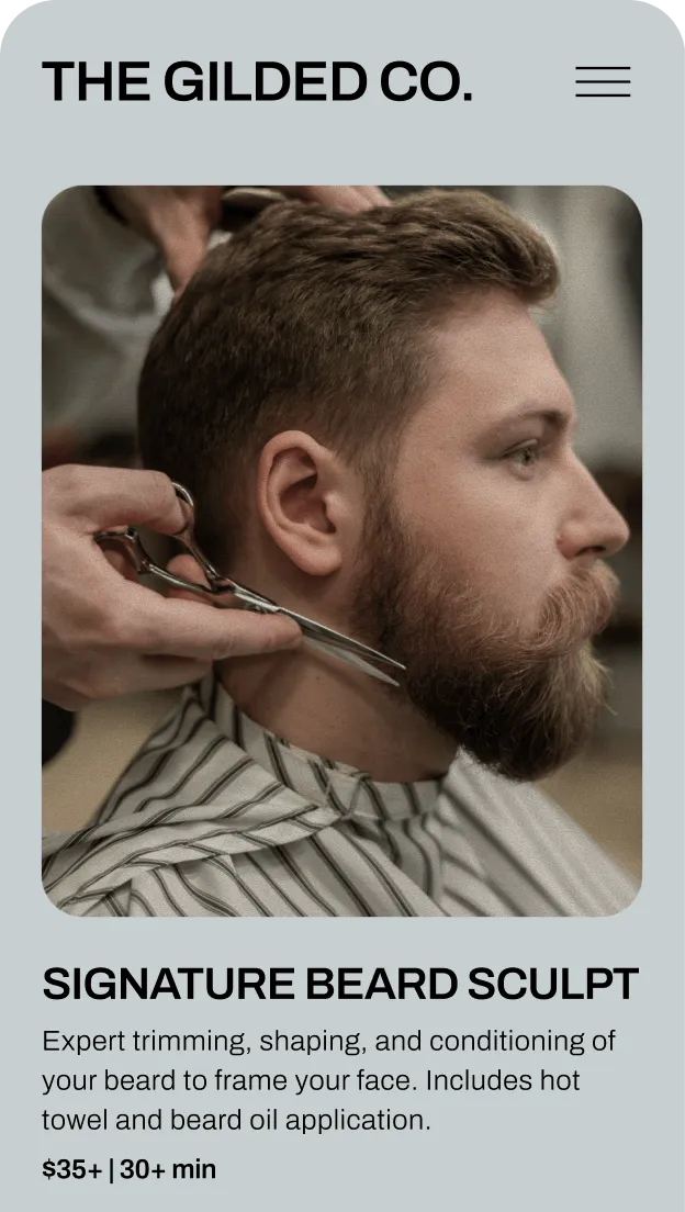 Man getting beard trimmed by a barber