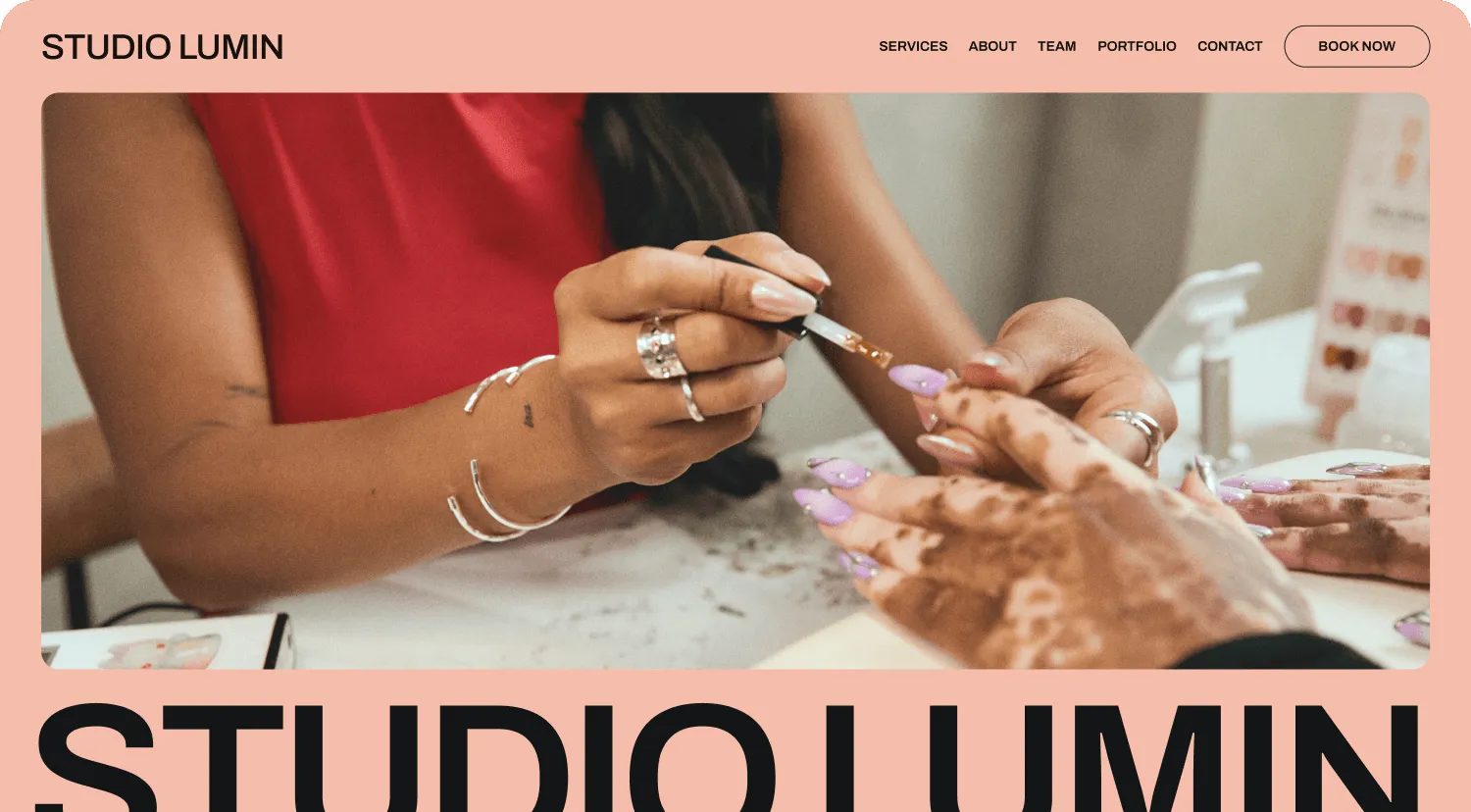 Image of a nail tech providing a manicure to a client