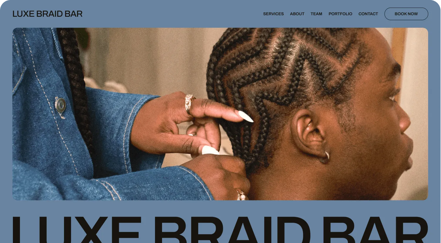 Desktop view of Luxe Braid Bar booking site, featuring image of hairstylist braiding a client’s hair