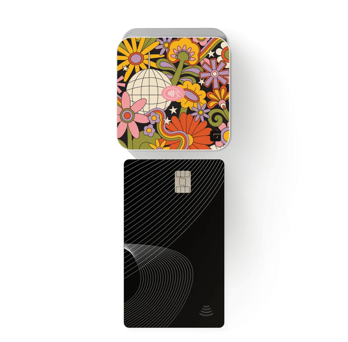 Image of a florally-designed GlossGenius Tap & Go reader above a black credit card.