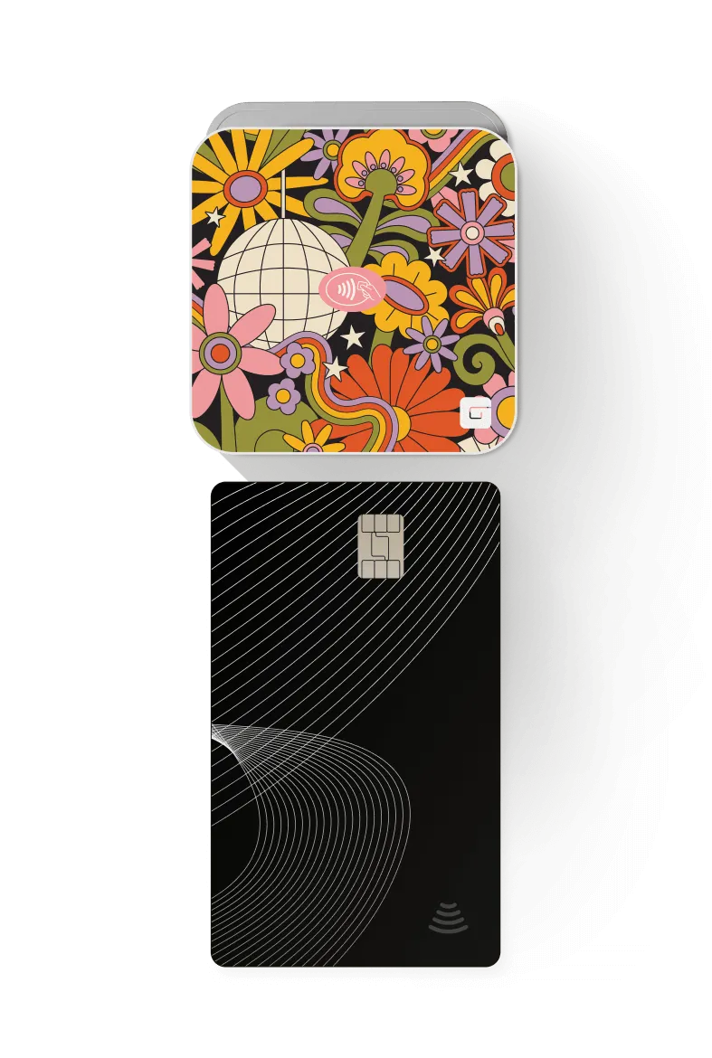A patterned GlossGenius Tap & Go reader above a black credit card