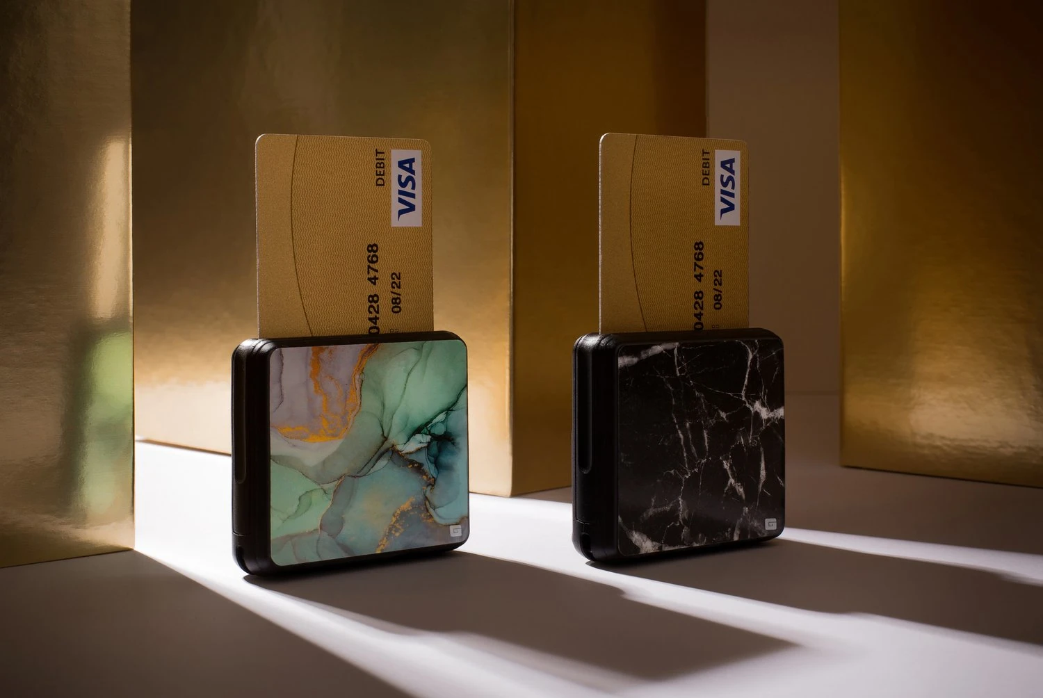 GlossGenius salon card reader in rose gold for accepting tap and chip payments