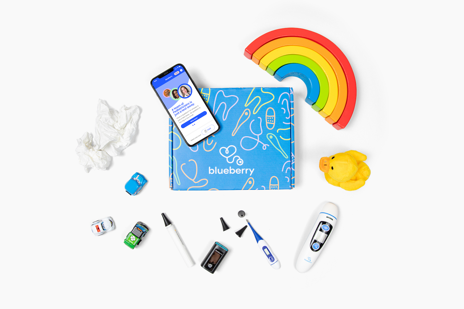 A phone, toothbrush, toothpaste, toothpaste, and other